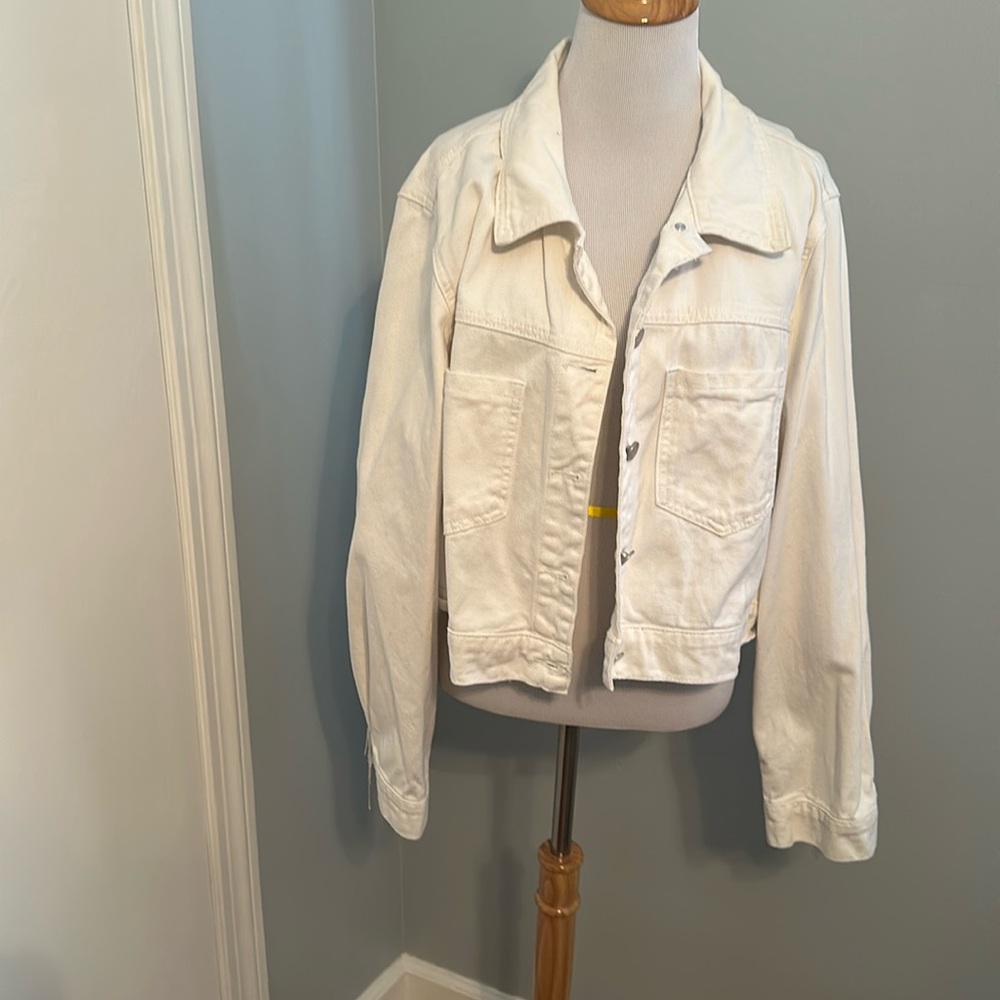 SHEIN white jean jacket with fringe.